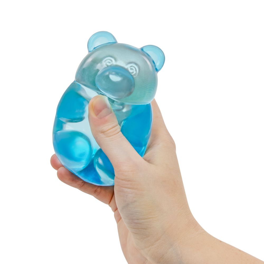 Blue jelly bear sensory toy being squeezed in hand, soft squishy fidget toy