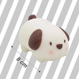 Close-up of the Squeeze Sploot Friends dog squishy toy showing its 8cm size