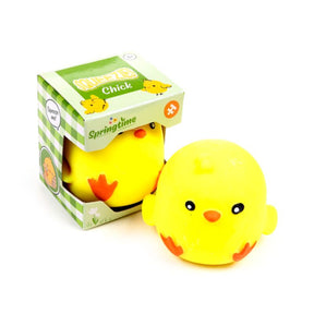 Yellow Squeezies Springtime Chick squeeze toy sitting beside its green gingham box packaging