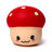 Red Squeezies Mushroom stress toy with a smiling face and cream polka dots