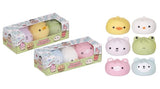 Two boxes of Squeezy Dumplings kawaii animal squishy 3-packs shown alongside all six individual squishy characters