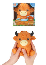 Squeezy highland cow stress fidget toy shown in hands and in box