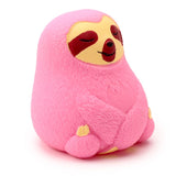 Pink Squeezy-O sloth squishy stress toy sitting with arms crossed and eyes closed