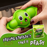 Two hands stretching the Squeezy Peasy kawaii pea pod squishy wide apart