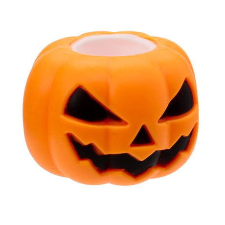 An orange jack-o'-lantern shaped candle holder with carved facial features and a light pink inner cup, shown on a plain white background.