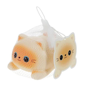 Kawaii cream and orange squidgy cat squishy toy in mesh gift bag with tag