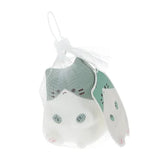 Green and white kawaii sitting cat squidgy squishy toy in mesh gift bag with tag
