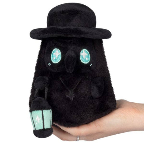 Squishable Alter Egos Plague Doctor Void black teal plush held in hand