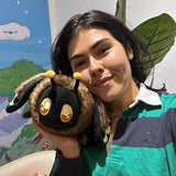 Squishable Mini Death's Head Hawkmoth plush lifestyle shot size reference