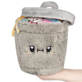 Squishable Mini Trash Can grey plush with open lid and colourful trash interior, held in hand