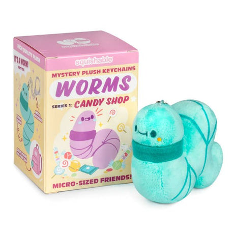 Squishable worm plush toy with packaging on a white background