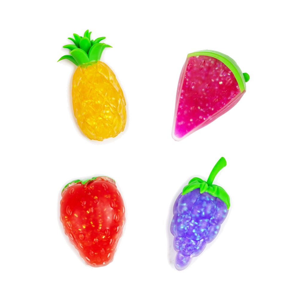 All four glitter gel squishy fruit fidget toys — pineapple, watermelon, strawberry and grape — laid flat