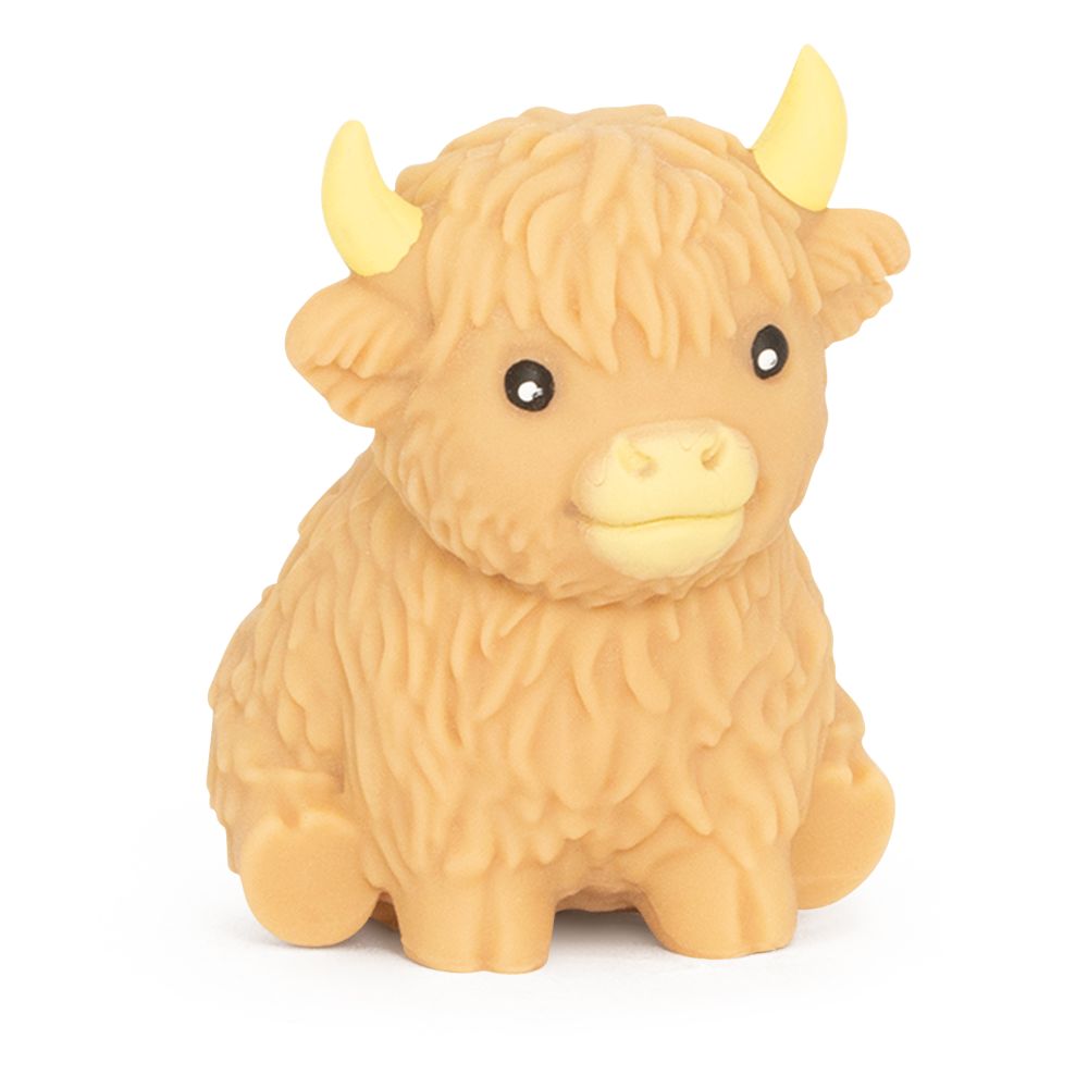 Close-up of tan cream Squishy Highland Cow showing detailed shaggy coat texture slow rise sensory fidget toy