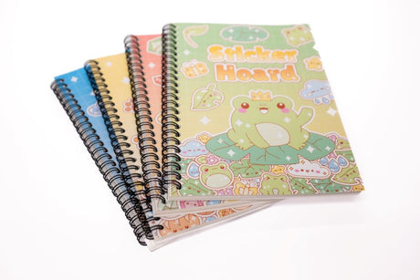 Four Sticker Hoard sticker books fanned with green frog cover design on top