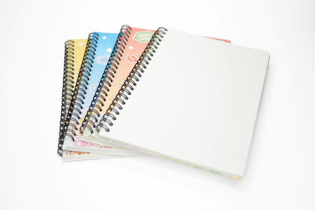 Four Sticker Hoard reusable sticker books fanned open showing spiral binding and pages