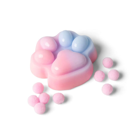Pink and blue ombre squishy paw print with scattered pink pom poms