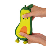 Two hands stretching the Stretch N Smash avocado fidget toy vertically to show its super-stretchy material