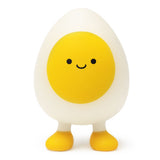 Kawaii egg Stretch N Smash fidget toy standing upright showing smiling face, white body and yellow yolk detail