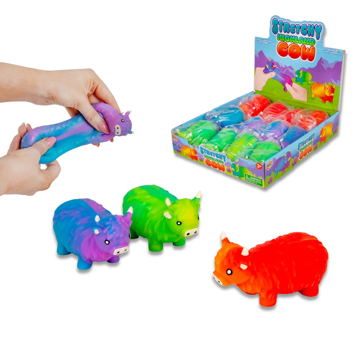 Three stretchy sand highland cow stress toys in orange-red, green-yellow, and purple-blue colourways shown with branded display box and hand stretching one