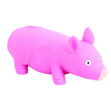 Side view of pink stretchy pig stress toy showing smooth rubber body and snout detail