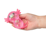 Pink large glitter gel Sugar Axolotl squishy resting in an open palm