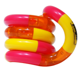 Hot pink, orange, and yellow Tangle Classic fidget toy coiled into its resting spiral shape