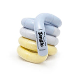 Blue, grey and lemon Tangle Jr. Clouds pastel twisty fidget toy coiled into a stack