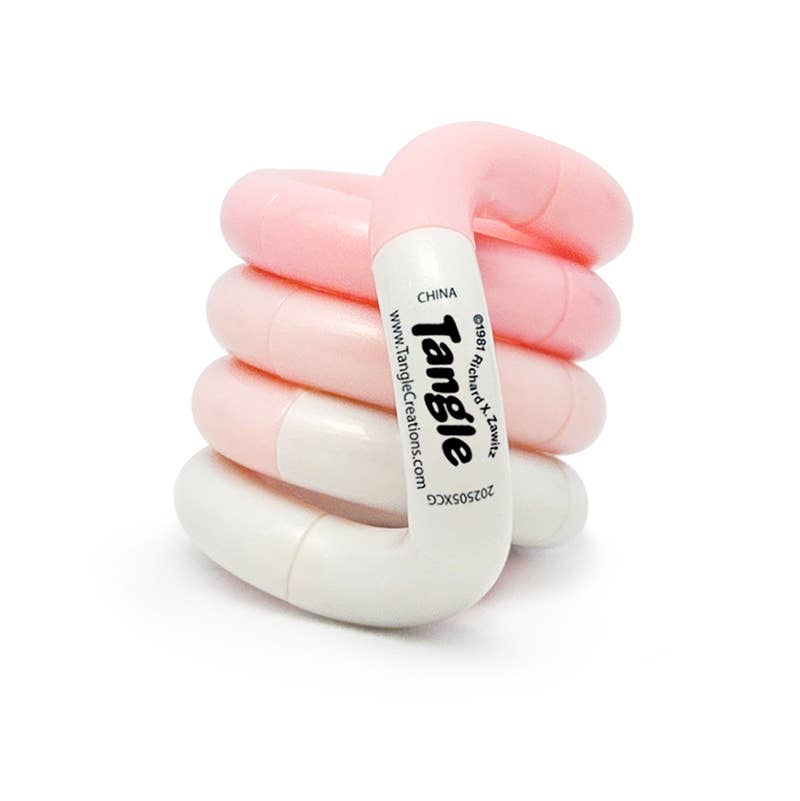 Pink and white Tangle Jr. Clouds pastel twisty fidget toy coiled into a neat stack