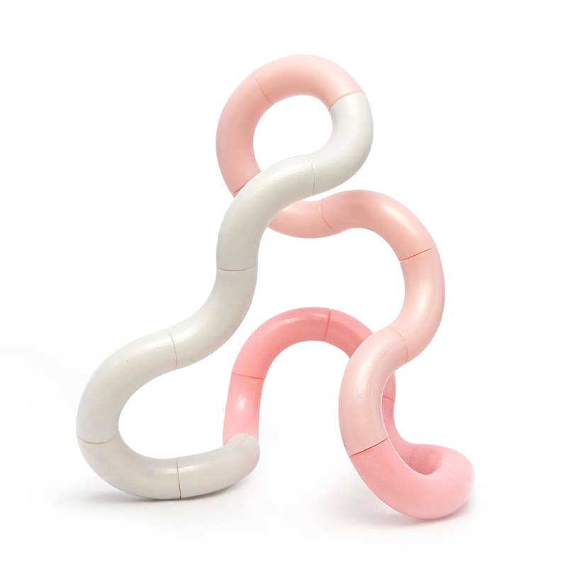 Pink and white Tangle Jr. Clouds twisty fidget toy twisted into loops and curves