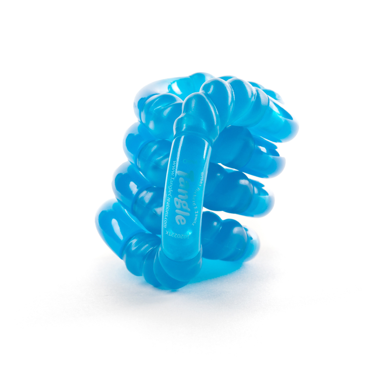 Blue glow-in-the-dark Tangle Jr. fidget toy with twisted textured segments, coiled into a stack