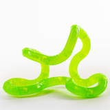 Green glow-in-the-dark Tangle Jr. scaly twisty fidget toy twisted into loops and curves