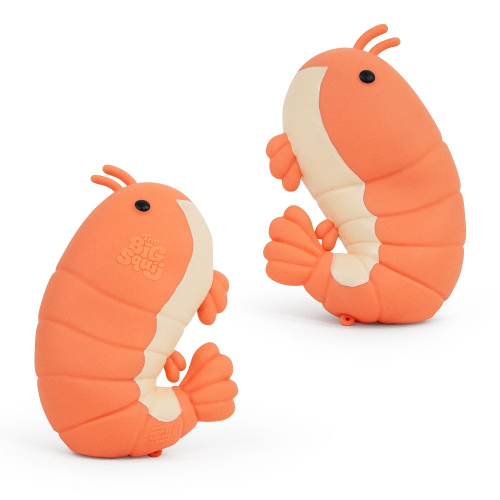 Two The Big Squij giant shrimp squishies standing upright in coral and cream