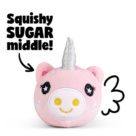 Pink unicorn plushie sensory toy with text graphic highlighting its squishy sugar filling