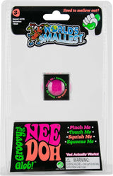 World's Smallest Nee Doh Groovy Glob pink mini squish ball shown in its blister packaging