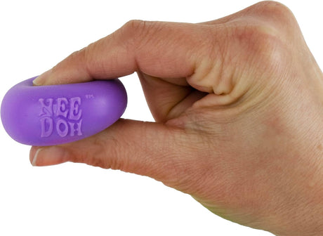 Hand squeezing a purple World's Smallest Nee Doh Groovy Glob between two fingers