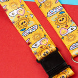Yellow strap with cartoon sun and cloud designs on a red background