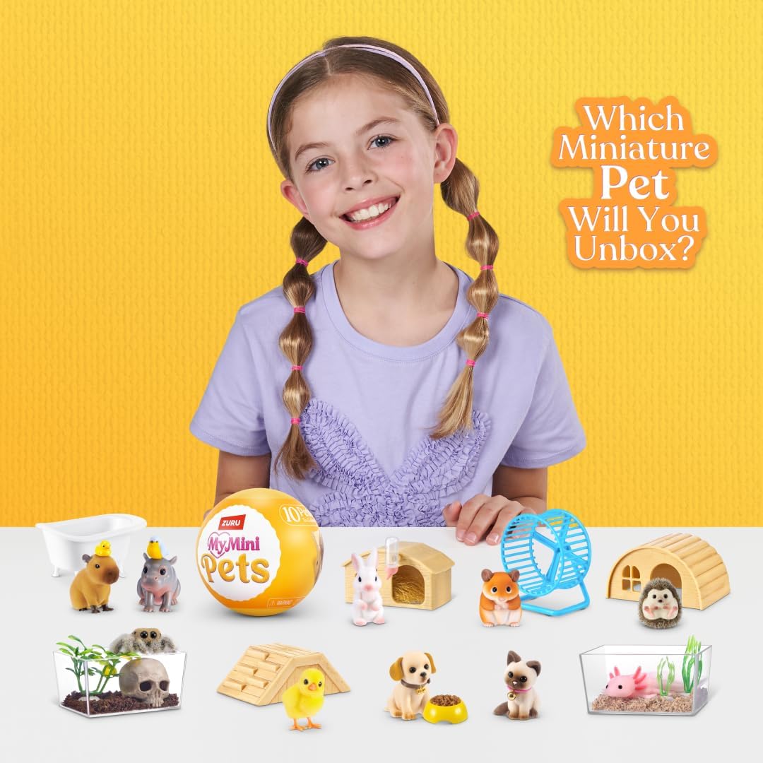 Child with Zuru My Mini Pets capsule and miniature pets including capybara, hamster and axolotl